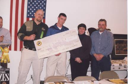 Dalton Whitley and his parents long with NWEF Chapter Committee member Bill Vanderlaan.